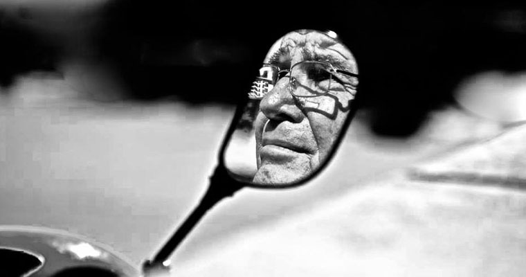 P-financial-B&amp;W-older-face-in-mirror