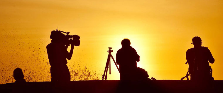P-Media-at-work-silhouetted-in-golden-sunrise