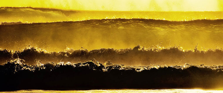 P-Medication-Wide-shot-of-golden-waves-crashing-onshore