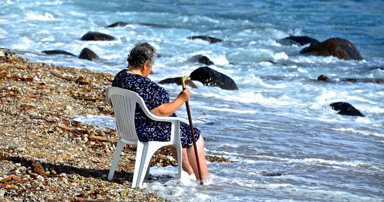 P-staffing-lady-seated-with-cane-in-shallows